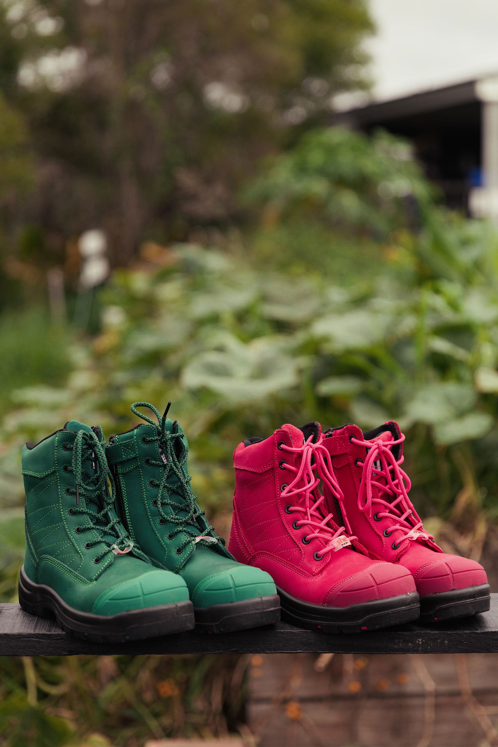 she wear safety work boots in green and pink