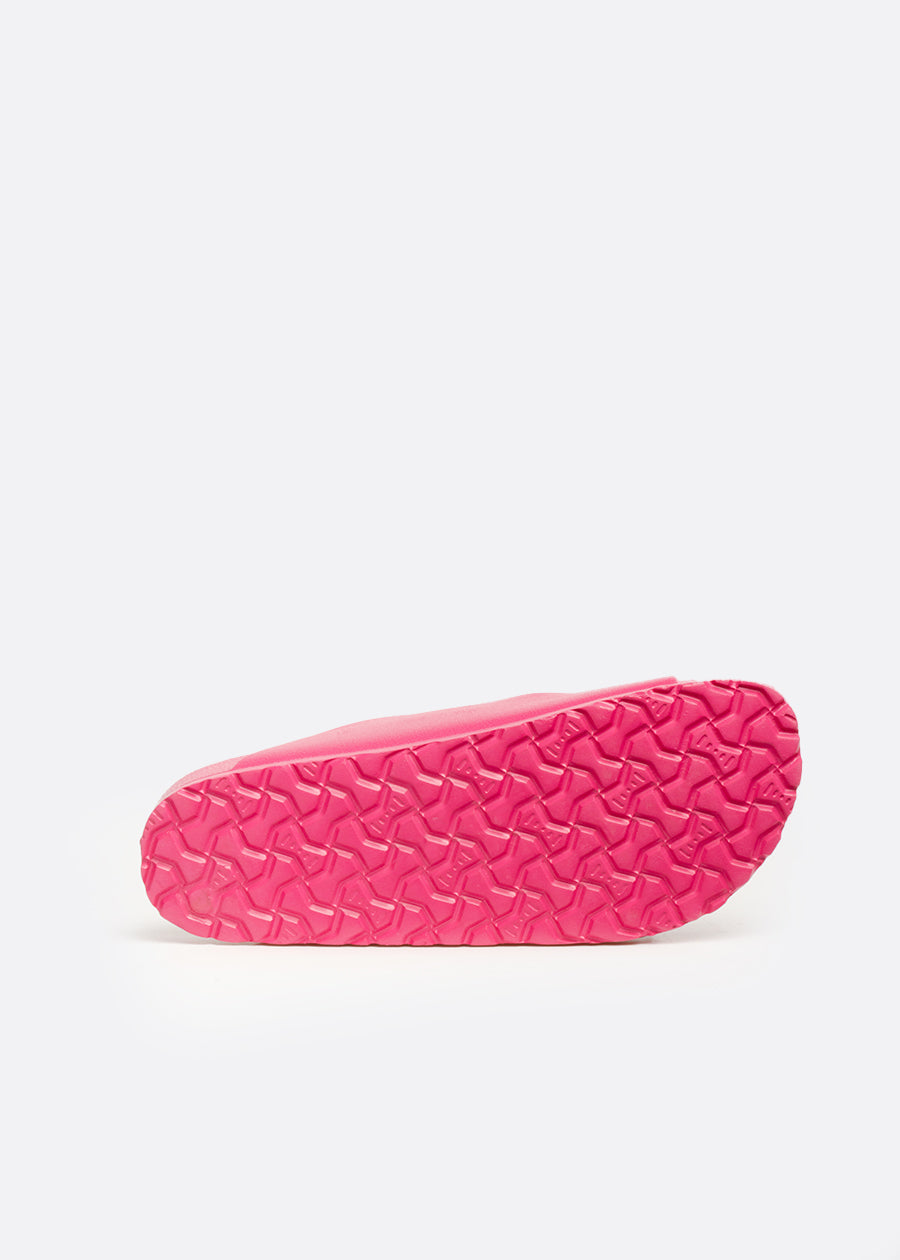 Hot pink sole of a Chill slide certified slip resistant