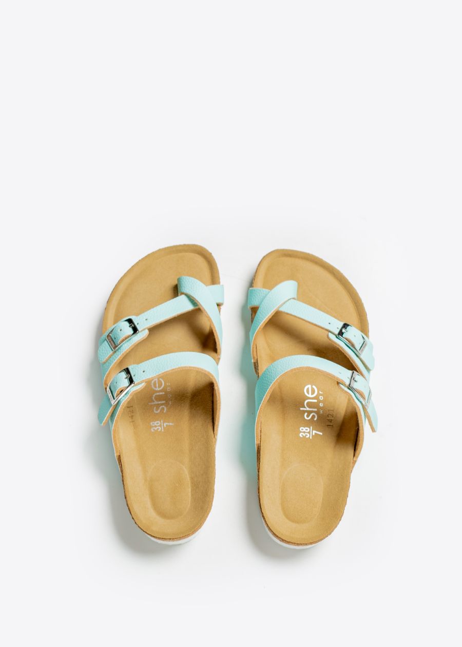 studio shot of arch support slides in mint blue