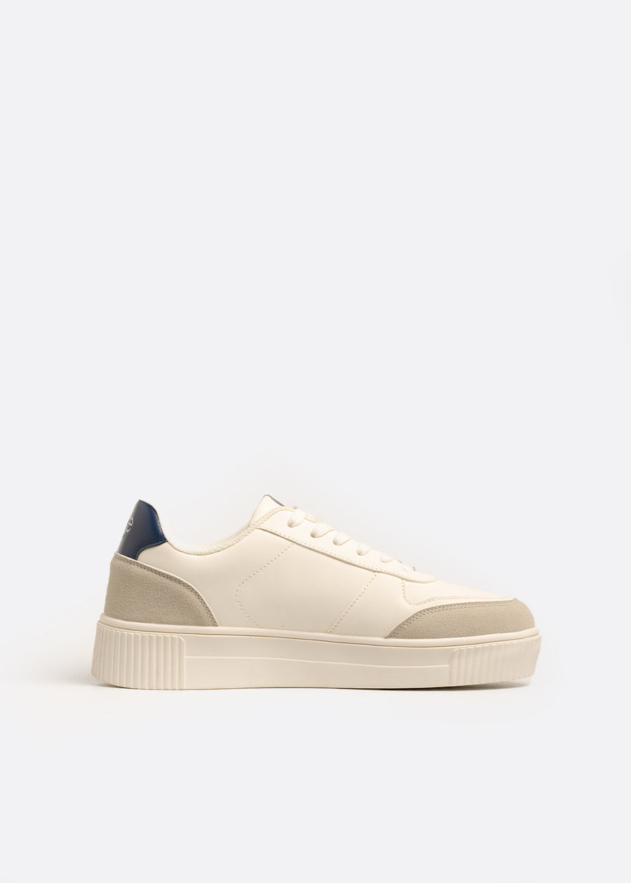 side view of womens white vegan sneakers